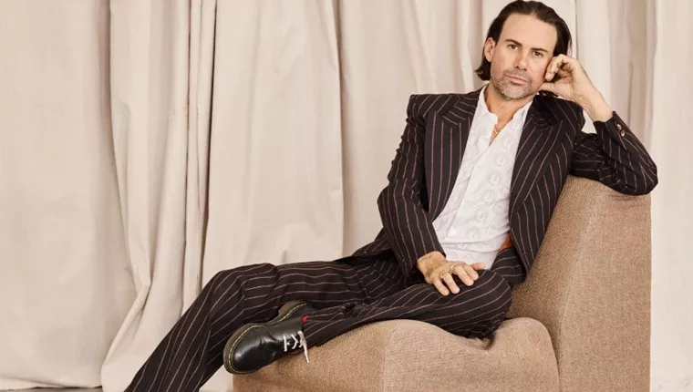 Phil Jamieson lounging on couch
