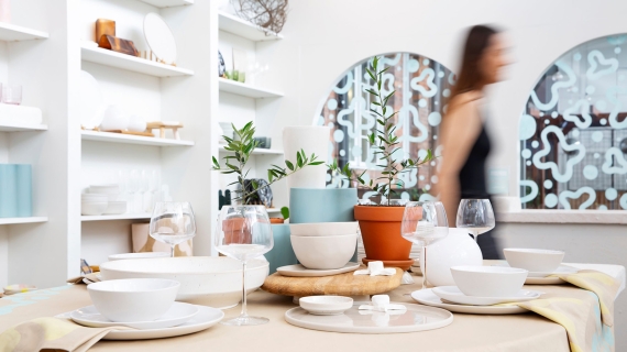 Colourful plates and pots in a white, bright studio 