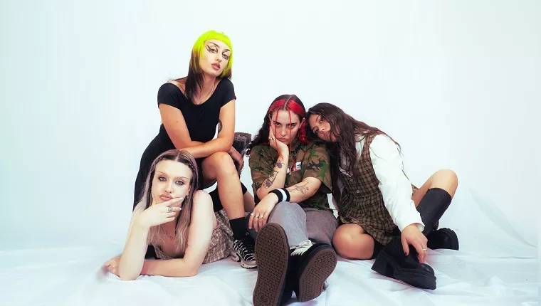 4 Persons lounging on the floor with white back ground 