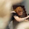 Lady blowdrying hair in salon